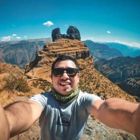 Waqrapukara Photo - Tourist Taking a Selfie with the Natural Wonder